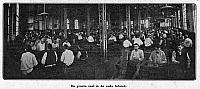 Afb.2 De sigarenmakerij op de eerste verdieping van de fabriek omstreeks 1910. De eigen fanfare van Goulmy en Baar,in1894 opgericht(10),droeg da...